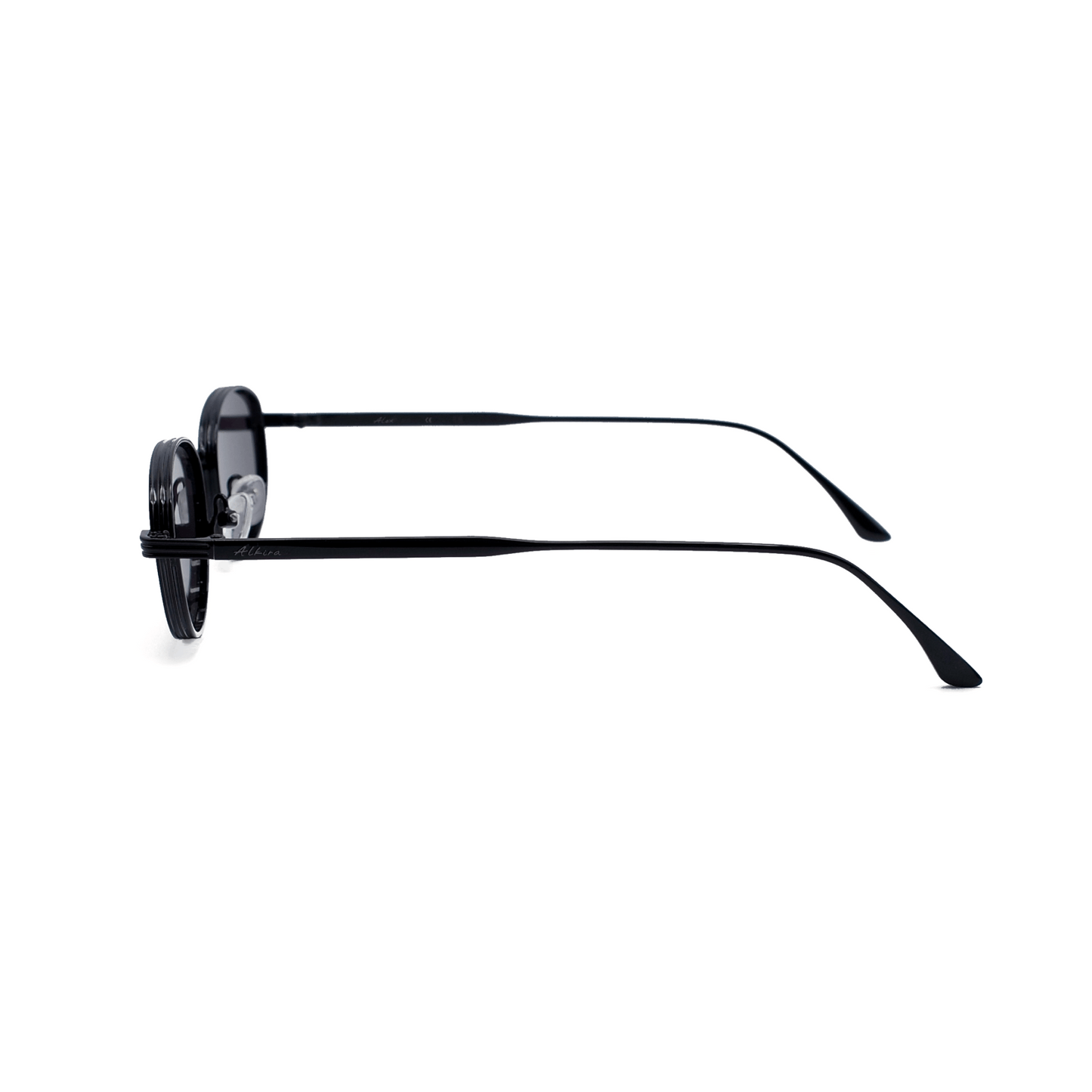 Black Alkira branded sunglasses on a white surface with a white background