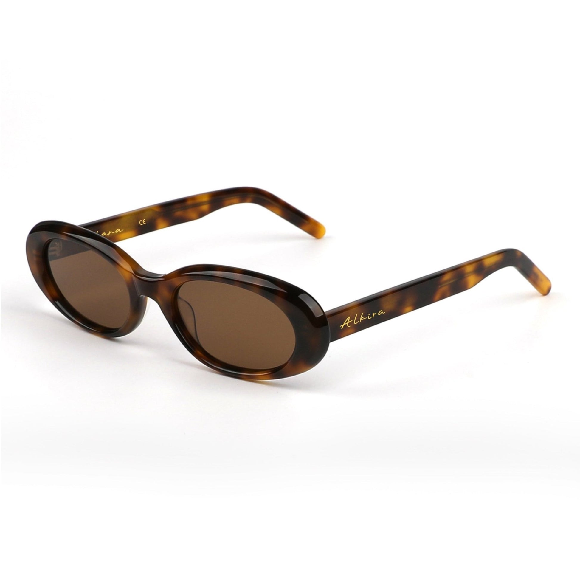 Alkira branded sunglasses with tortoiseshell frame and brown lenses on a white background